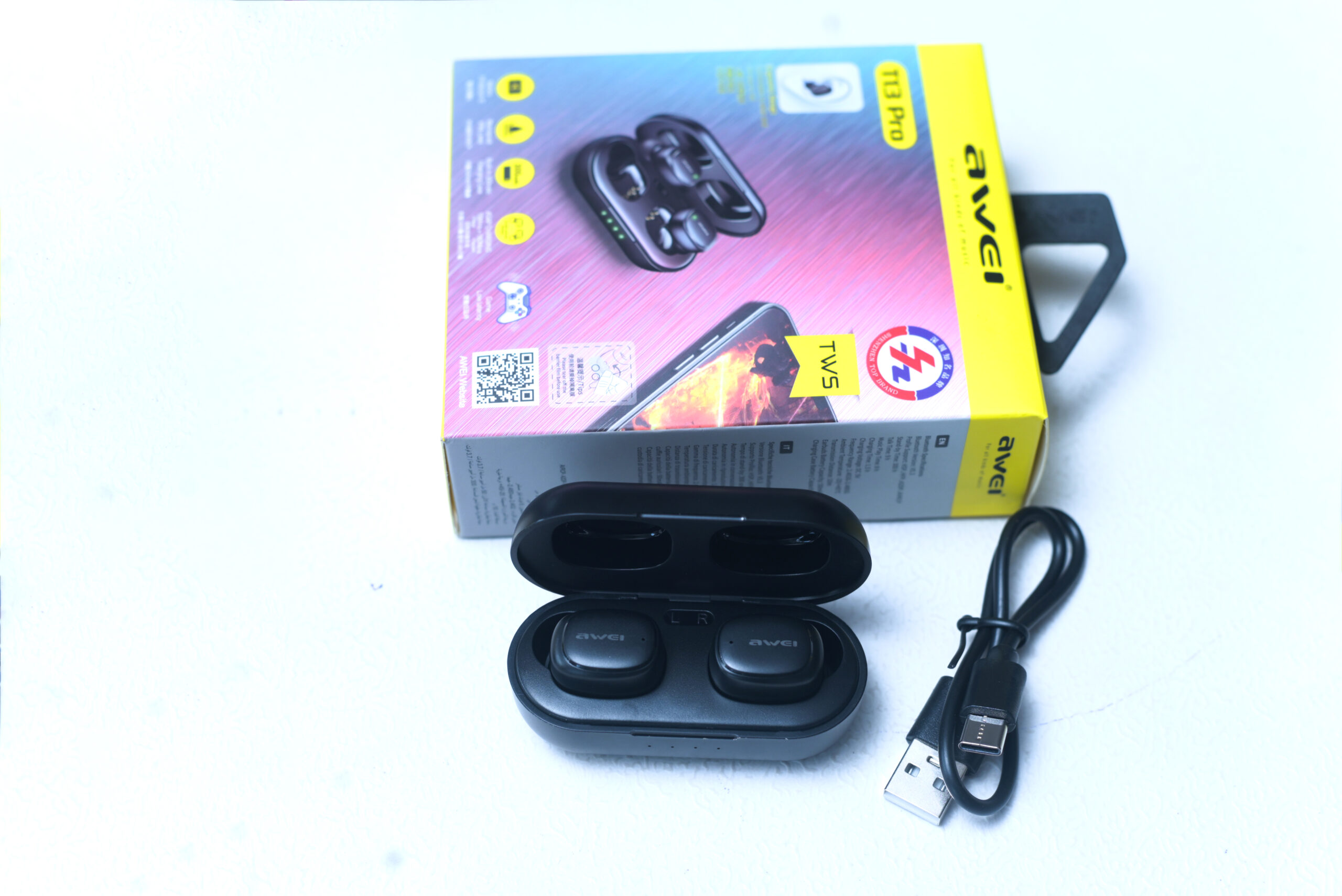 TWS Bluetooth earphones with HD sound and compact case.